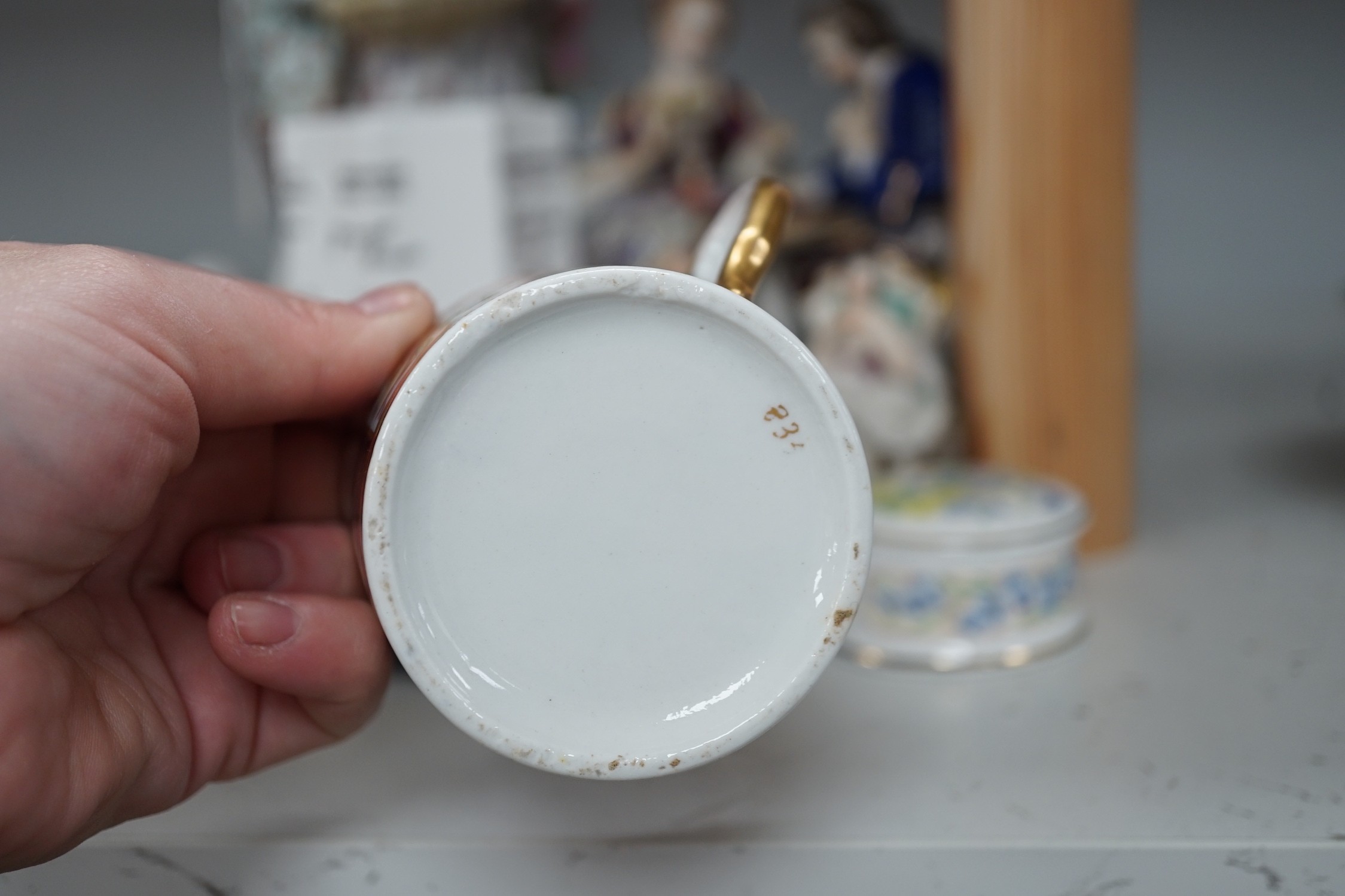Two Meissen leaf dishes, a Dresden plate, two group figures and mixed ceramics, tallest 25cms high